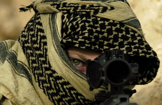 How did the kerchief evolve into a military scarf?