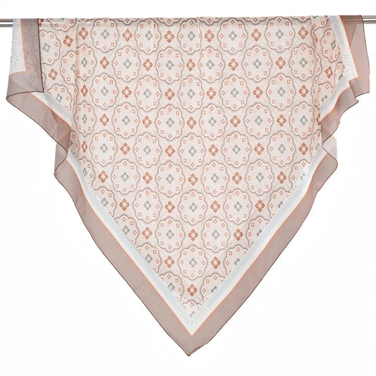 Square printed scarf displayed open with a scalloped decorative border