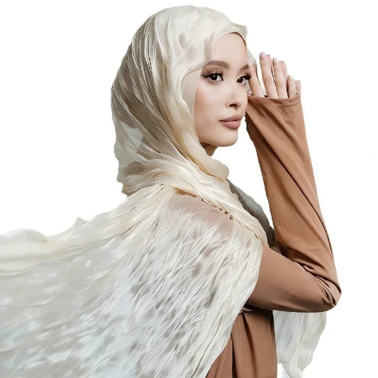 Ivory textured hijab draped across a model's shoulder over a brown top