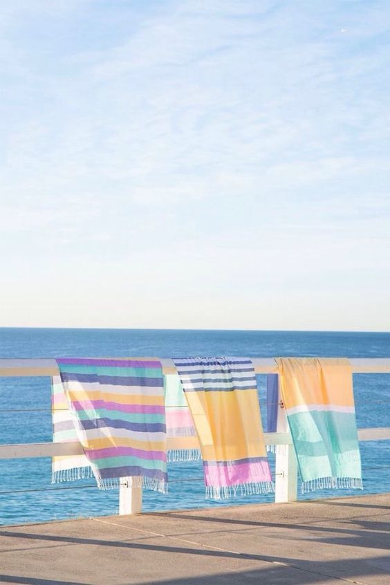 Difference between a beach towel and a scarf