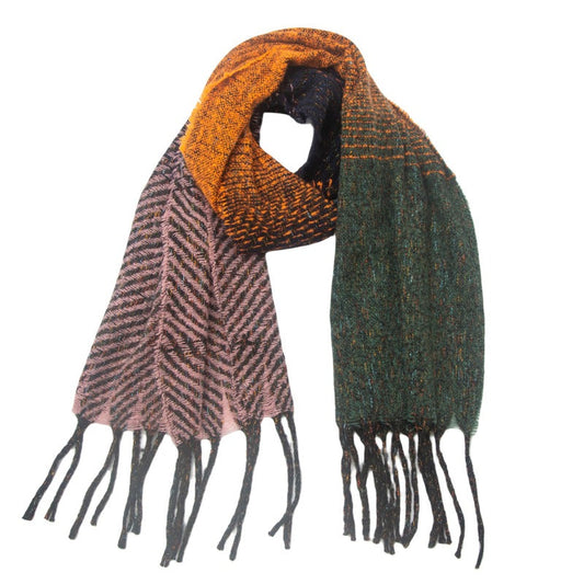 Multicolour tassel scarf arranged in a loop with orange near the top, a green section and a pale chevron-patterned hanging end