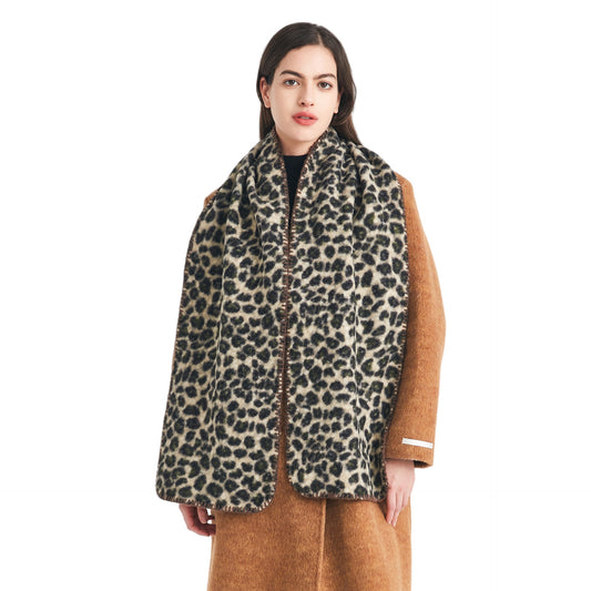 Used as a shawl, headscarf, or even a blanket