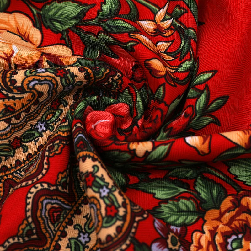 Details of the red babushka headscarf with tassels