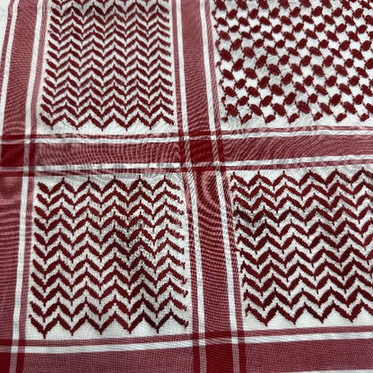 Red and white keffiyeh details