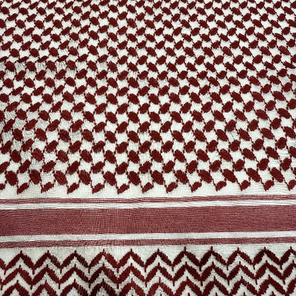 Red and white keffiyeh details