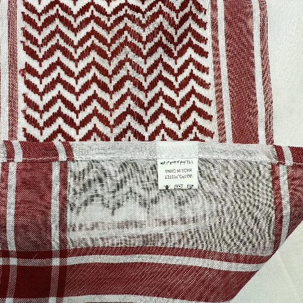 Red and white keffiyeh details