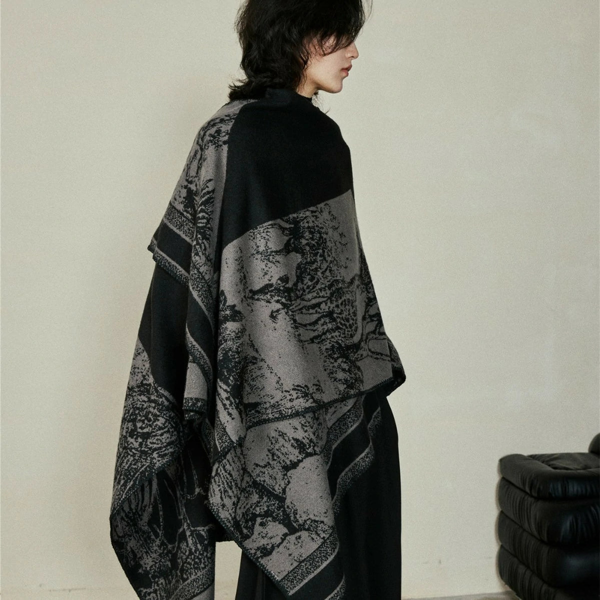 woman wearing a black shawl