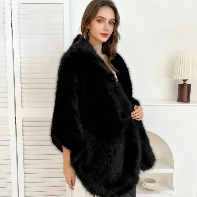 A woman wearing a black faux fur shawl standing sideways