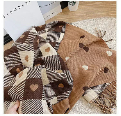 Scarf with brown heart printed on it