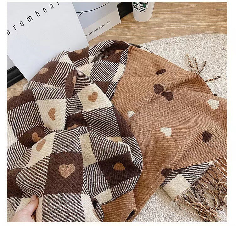 Scarf with brown heart printed on it