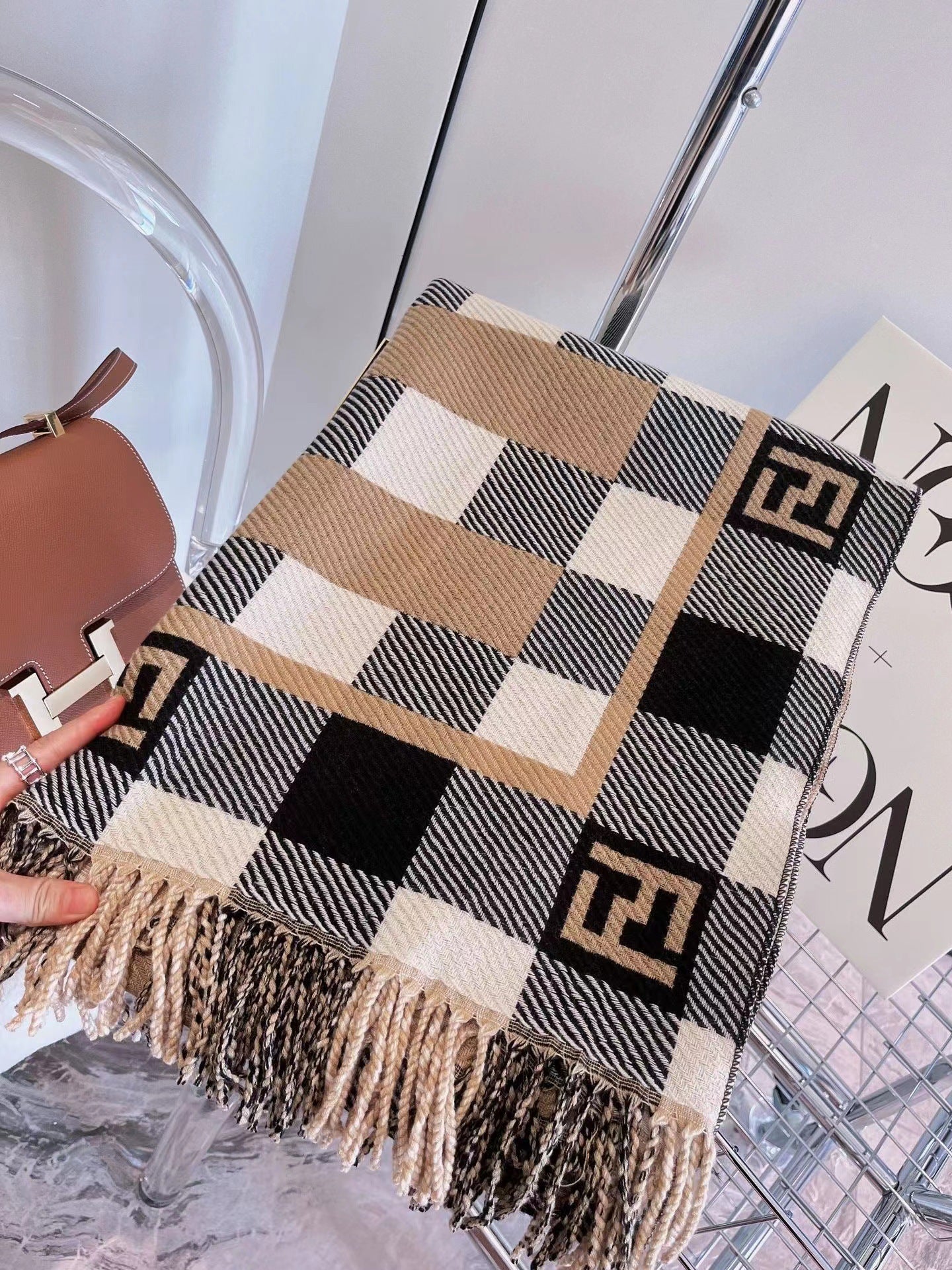 Scarf with black checkered pattern