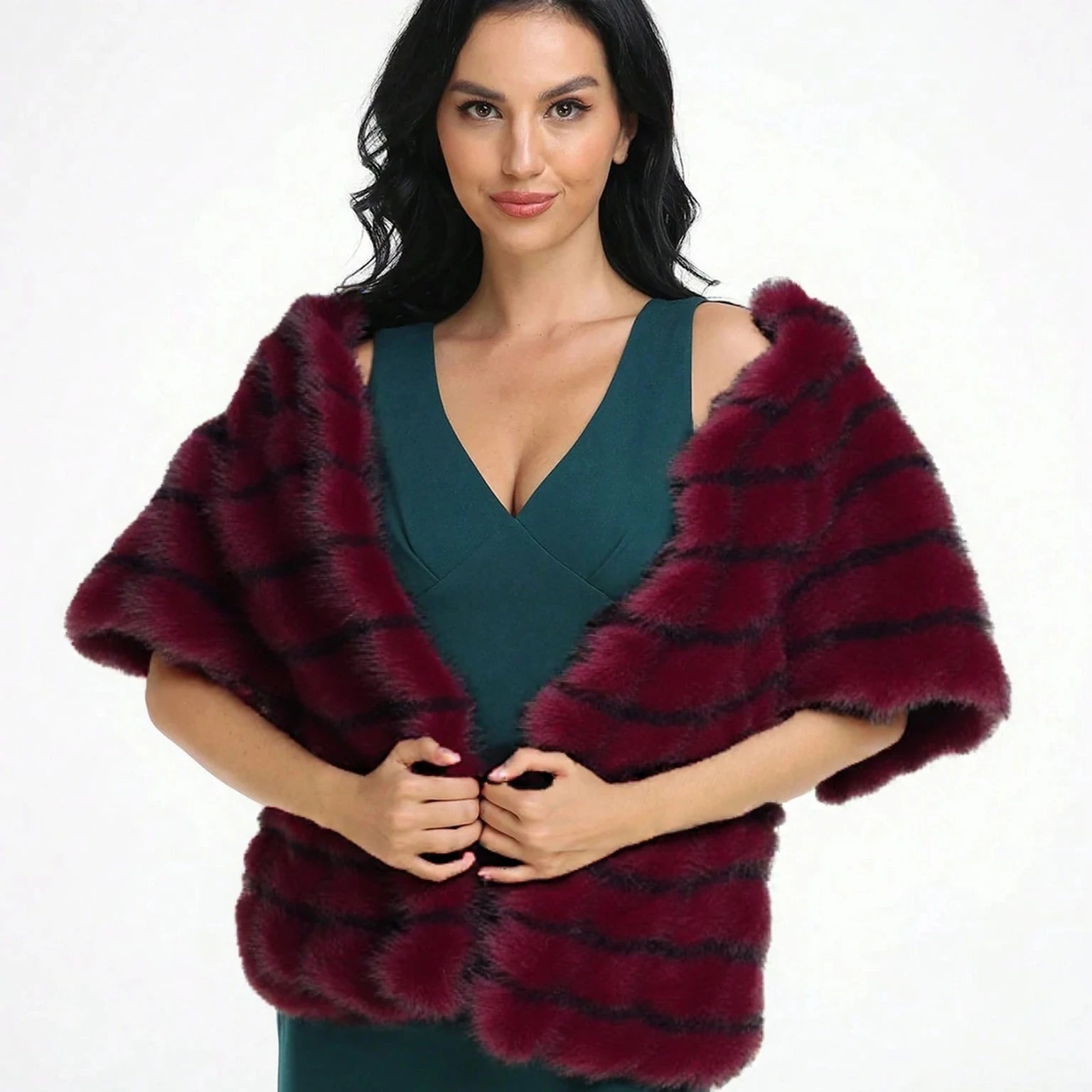 A woman wearing a red faux fur shawl