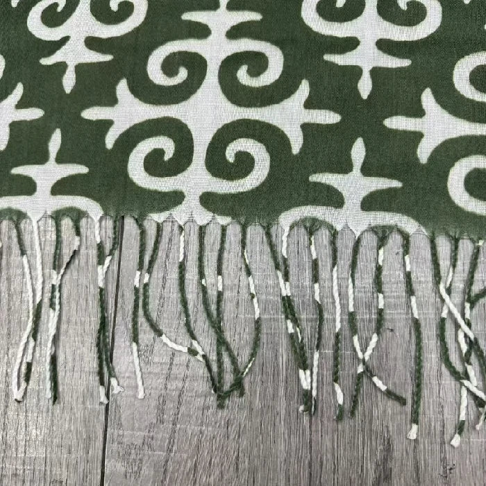 Green cross-stitch square scarf with tassels