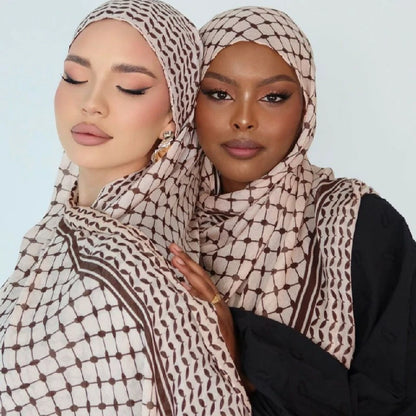 Two women wearing modal headscarves